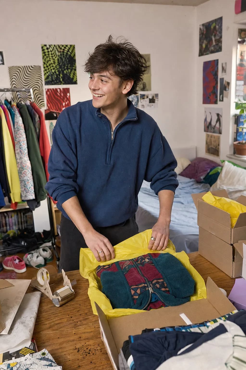 Young founder preparing a customer order